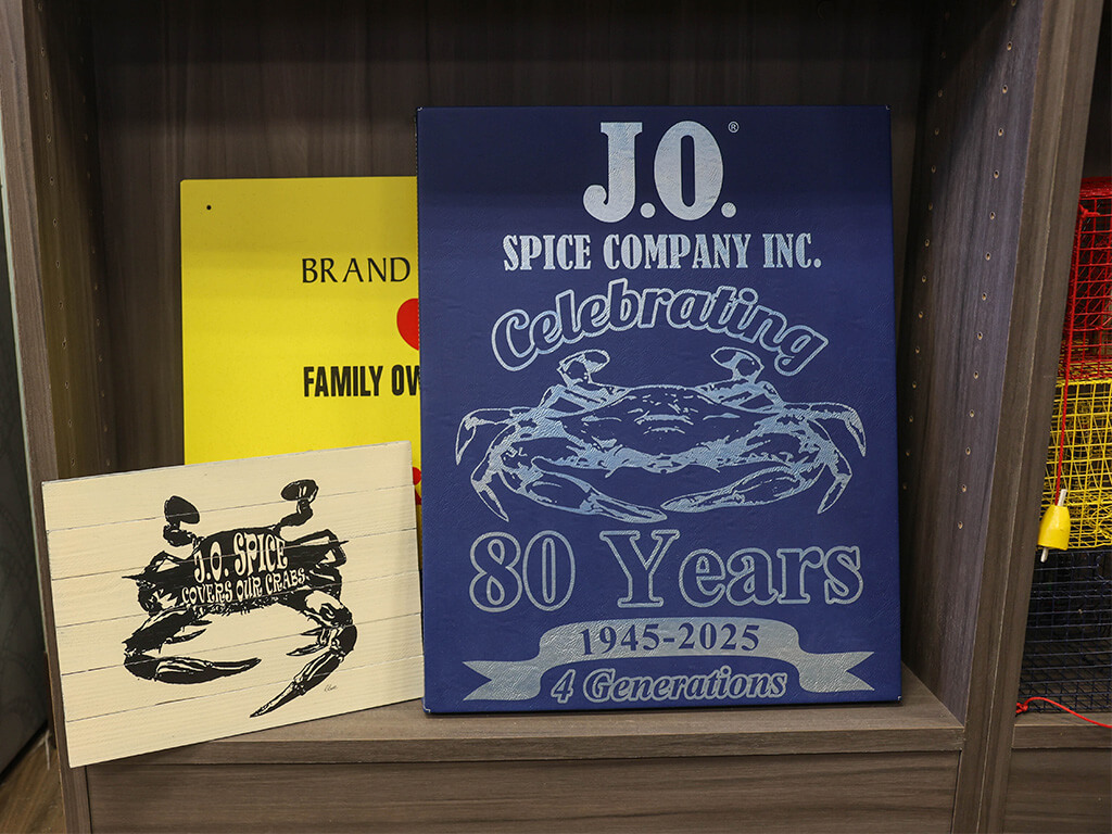 Story of J.O. Spice Company Inc. showing the J.O. Spice team gathered together at a crab feast event