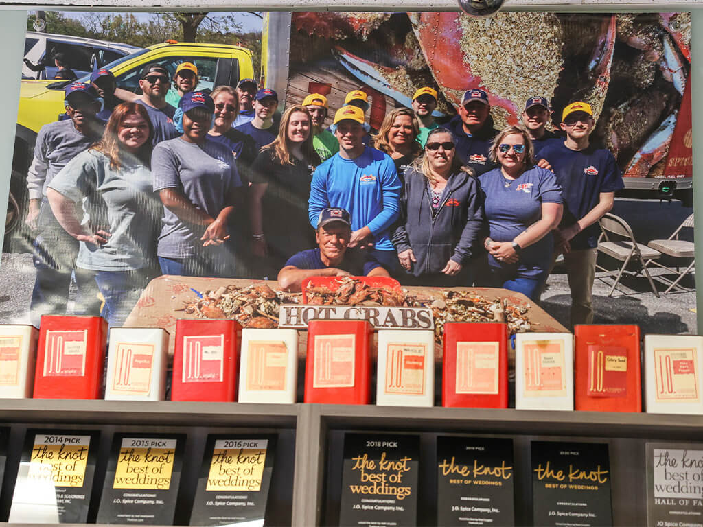 Story of J.O. Spice Company Inc. highlighting the production process as seasoning is measured and poured in the warehouse